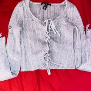 greenish grayish longsleeve shirt with laces